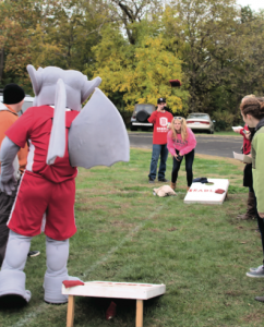 Sophomore Spanish and English double major Anna Huffman tossed bags with Kaboom! at Saturday’s student tailgate.