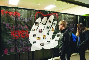 Students walking through this week’s Tunnel of Oppression were faced with issues in today’s society. Per- sonal stories, statistics and reenactments raised awareness of abuse, assault and other forms of oppres- sion. The Tunnel of Hope, a new feature this year, called students to action. Photo by Maggie Cipriano.