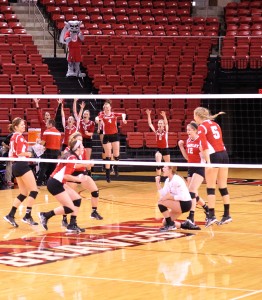 Bradley celebrates after scoring a point against Evansville, a match the Braves won 3-0.