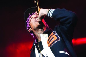 Rapper and hip-hop artist Wiz Khalifa performed in front of a sold-out crowd at Renaissance Coliseum Nov. 14. Openers included local artists DJ Caleeb, D Webb and CHISongwriter. See A3 for a listing of police reports from the night of the concert. Photo by Maggie Cipriano.