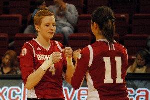 Senior Madison Kamp (4) celebrates with freshman Afton Sobasky (11) during Bradley’s victory over Drake in the team’s final game of the season last weekend. Photo by Maggie Cipriano.