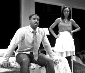 Seniors Aris-Allen Roberson and Kiayla Jackson pose as Martin Luther King Jr. and Camae in a dress rehearsal for the civil rights theatre production of ‘Mountaintop.’ Photo by Duane Zehr