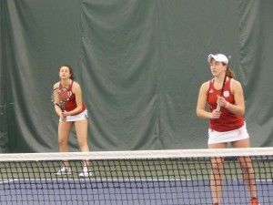 Irinka Toidze (left) and Ariel Dechter (right) await a serve in their doubles victory against Vaparaiso. Photo by Chris Kwiecinski.