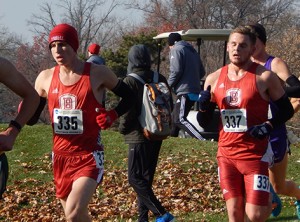 Freshman Michael Ward (right) and sophomore Michael Moyer (left) race in the NCAA Regionals last year. Photo by Garth Shanklin