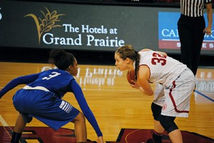 Freshman Madison Dellamuth looks to pass the ball to a teammate during Bradley’s win over Evansville on Sunday. Photo by Maggie Cipriano.