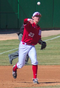 Freshman third baseman Allen Beer throws to first base earlier this seson. Beer filled in for an injured Spencer Gaa for the Braves. Photo by Dan Smith.