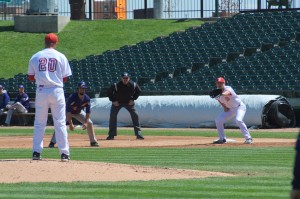 Junior pitcher Brent Stong checks to first during Sunday’s game vs. Evansville. The Braves lost 10-0. Photo from Scout Archives.