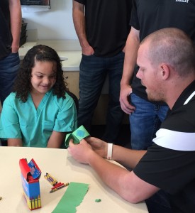 Graig Weber (right) and the Bradley baseball team met with children at the Children's Hospital of Illinois earlier this week. Photo by Chris Kwiecinski.