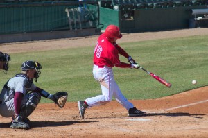 Senior outfielder Isaac Smith swings at a pitch against SIU in March. Smith homered to lead the Braves past Iowa Tuesday. Photo by Dan Smith.