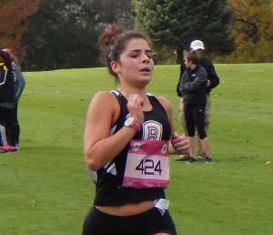 Freshman Nicole Alfano draws closer to the finish line at the Bradley Classic in October. Alfano won the 5,000 meters in Macomb last weekend. Photo by Garth Shanklin.