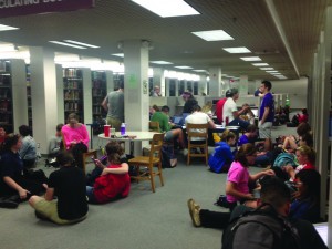Students gather in the Cullom-Davis Library basement during Monday night’s lockdown after gunshots were reported on Bourland Avenue. Photo by Michael Echeverri.