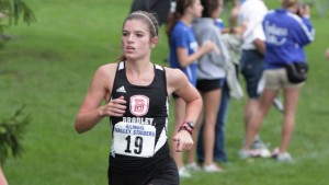 Senior Kylie McKinney competes in a cross country meet last year. McKinney finished fourth in the Illini Open. Photo via bradleybraves.com