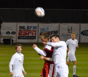 Senior Grant Bell (left) goes up to head a ball against a Missouri State defender in a game on Oct. 17. Bell recorded three asissts against Central Arkansas on Oct. 24. Photo by Anna Foley.