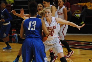 Whitney Tinjum (30) defends an Indiana State player in a game last season. She recorded a double-double against Detroit. Photo via Scout Archives.