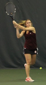 Sophomore Alejandra de Lasa returns a volley during a match. Photo by Ann Schnabel.