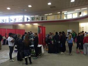 Students mingle in Markin Recreational Center during the Fit Fair organized by dietetics majors. Photo by Anna Foley.