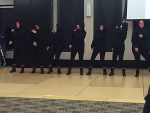 The nine new members of Sigma Lambda Gamma at Bradley performed a routine at their neophyte presentation Saturday. Photo by Michael Echeverri.