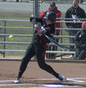 Elizabeth Leonard swings at a pitch during a game against Loyola University last season. She is one of six sophomores on the Braves roster this season. Photo via Scout Archives.