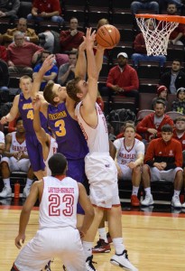 Luuk van Bree (center) goes up for a rebound in a game against Northern Iowa. Van Bree is third on the Braves with 4.3 rebounds per game. Photo by Anna Foley.