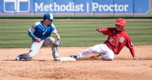 Junior third baseman Spencer Gaa slides in safely to second base in a game against Illinois College. Gaa is hitting .316 this year with 17 runs batted in and a pair of home runs. Photo submitted by Dan Smith.