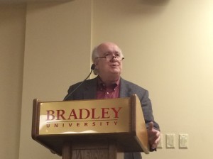 Kenneth Himes, an associate professor at Boston College, discussed the ethics of war and drone warfare Tuesday to a packed Marty Theatre. Photo by Maddie Gehling.