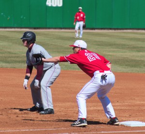 First baseman Paul Solka gets ready for a possible pick off attempt during a game last season. Solka is batting .342 in 19 games this season. Photo via Scout Archives.