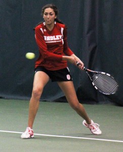 Freshman Malini Wijesinghe hits a backhand return in a match in April against Southern Illinois. Photo by Ann Schnabel.