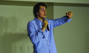Comedian Kevin Breel talks about his past struggles with depression and suicide last night in the Michel Student center Ballroom. Photo by Shelby Caruso.