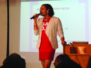 Jacob Tobia, a comedian LGBTQ+ advocate and author, speaks about their life journey concerning gender identity last night for an event hosted by Common Ground. Photo by Shelly Caruso.