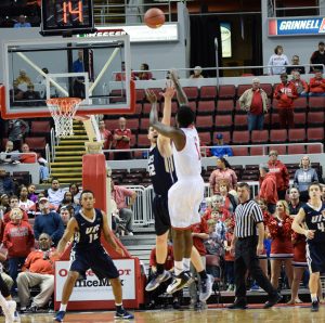 Junior Donte Thomas puts up a contested shot in a win earlier this year against Illinois-Springfield. ￼photo by Justin Limoges