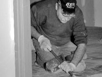 A construction workers works to transform the old Health Center space into the new Pre-law Center. Photo by Brooke Rumbold