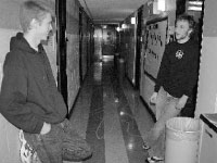 Roommates freshman mechanical engineering major Erik Bohler and junior philosophy major Andrew Linden talk in the hallway of Heitz Hall. The roommate survey, which is used to pair students based on compatibility, may undergo change. Photo by David Needham