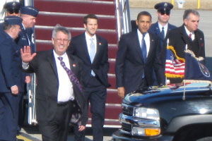 President Barack Obama, Rep. Aaron Shock and Secretary Ray LaHood arrive at the General Wayne A. Downing Peoria International Airport. Obama visited Peoria last week to speak at Caterpillar Inc. about the new stimulus package. The stimulus package, which was signed into law on Tuesday, will include tax credits and an increase in Pell Grants. Photo by Mat Shaver of WCBU