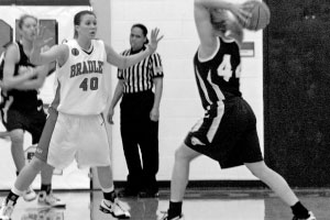 Senior Kelly Krumwiede defends the UNI passing lanes. The Braves went on to win the game by a score of 69-58 to add another MVC victory to their total. Photo by Adam Moulton