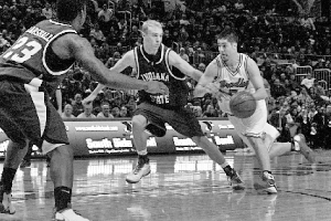 Sophomore Sam Maniscalco drives to the lane during the Braves’ match-up against Indiana State. He finished with 11 points in Bradley’s victory. Photo by Megan Loos