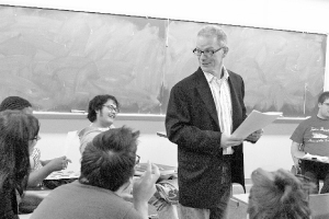 English professor Kevin Stein teaches a creative writing class. Stein is the Illinois Poet Laureate and has received various other awards and honors. The author and poet takes inspiration from other authors but also learns from their missteps. Photo by Megan Loos