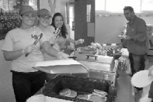 Members of Kappa Delta sorority serve pancakes during a pancake breakfast. The event was part of the sorority’s weeklong philanthropy. Photo courtesy of Kappa Delta