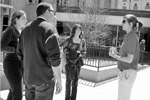 Senior music business major Julie Hill gives a tour to prospective students on a visit day. Because of the economy, deposits for the the freshmen class are lower than usual. Photo by Megan Loos