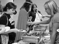 Students are served food from Alexander’s Steakhouse in the basement of the Markin Center.