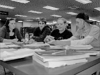 Students study at a table in the Cullom-Davis Library. This year, there will be more open space in the library to study during finals. The change is in response to a student survey received last year. Photo by Katrina Sathoff