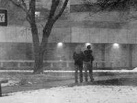 Students walk through the quad on sidewalks cleared by BU Grounds Crew. A weekend storm made traveling difficult for students. However, the university is prepared for winter with eight full-time members and eight snow removal trucks. Photo by Megan Loos
