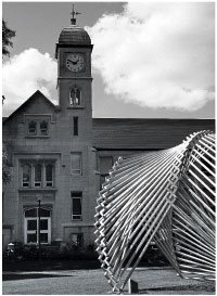 The clock tower atop Westlake Hall is slated for improvements that will be completed soon. Photo by Louis Amberg