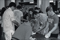 Students tie-dye shirts last Saturday as part of Dyeing to Vote, an event that promoted political awareness and allowed students to register to vote. Photo by Megan Loos