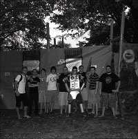 Members of Theta Xi pose outside of the house they constructed out of cardboard for Shack-a-Thon. Photo by Megan Loos