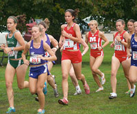 Freshman Sarah Hallstein runs in the middle of the pack at Detweiller Park at last weekend’s Bradley Open. Photo by Megan Loos