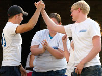 Nick Swiatkowski high-fives Andrew Kerr after the two were elected student body president and treasurer. Photo by Megan Loos