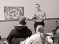 Bradley alumni visit EHS 120 classes and play a board game with students. The game, called BU Who Knew?, is designed to teach freshmen about Bradley’s history. Photo courtesy of Duane Zehr