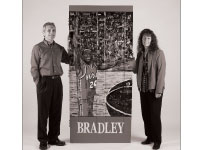 Above: Tom Gunter and Lori Luthy stand in front of their Bradley door. Below: The door while it was being completed. Above by Duane Zehr.