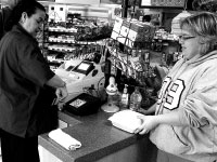 Freshman education major Kelsey Noe purchases food at Center Court, which is now open until midnight Monday through Thursday and until 8 p.m. Friday and Saturday. Students requested the new hours, because there was previously nowhere to dine late on campus. Photo by Megan Loos