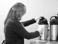A student worker serves coffee in the new Cullom-Davis Library cafe. The cafe was the idea of a committee that was created as a response to low Princeton Review rankings. Photo by Megan Loos